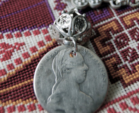 A Maria Theresia Thaler on a Palestinian iznaq or chin-chain