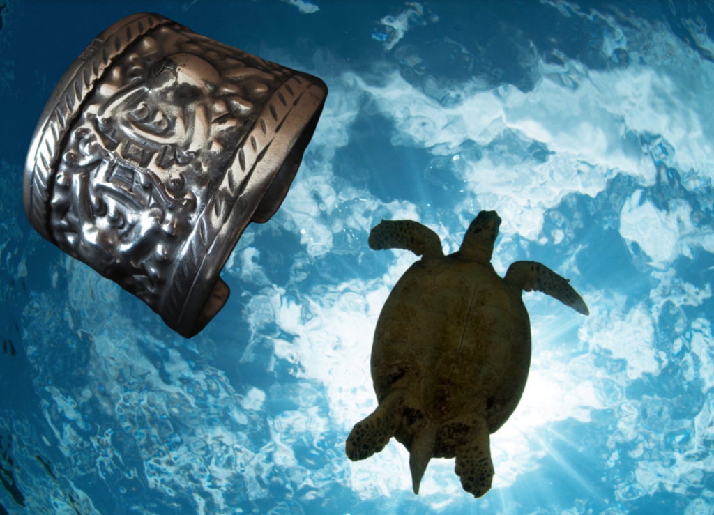 Stylized turtles on this Palestinian bracelet bring fertility and abundance