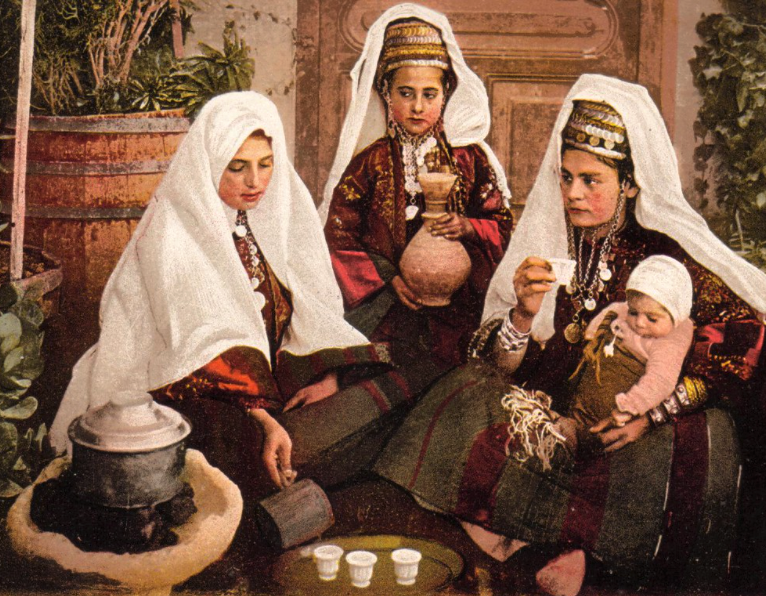 Bethlehem family taking tea.