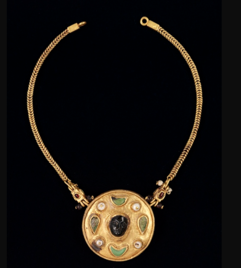 Necklace with cameo face pendant, from Thaj. National Museum, Riyadh